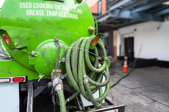 Grease Trap Cleaning of Keene workers