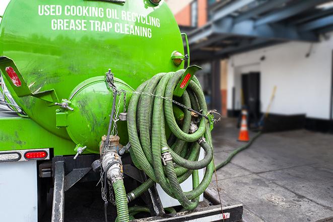 pump truck removing waste from a grease trap in Antrim NH